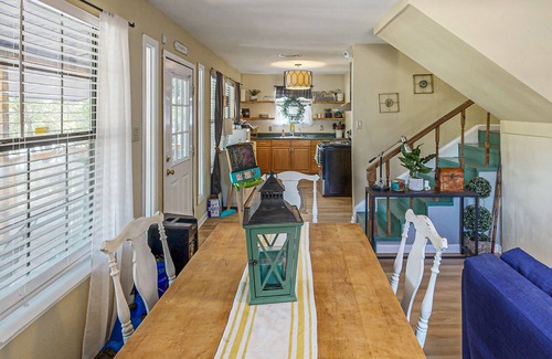 Bandera Cabaña | Riverside Retreat with outside dining area, deck and internet