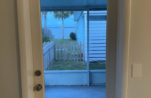 Tropic Cabaña | Riverview Cottage with Private Patio and Backyard
