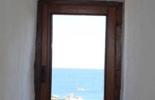 Capo Testa Apartamento | Romántica torre de la Edad Media en la costa de Cerdeña