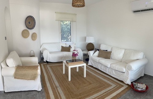 Gundogan Casa | Romantic hillside villa with stunning views, community beach and pool