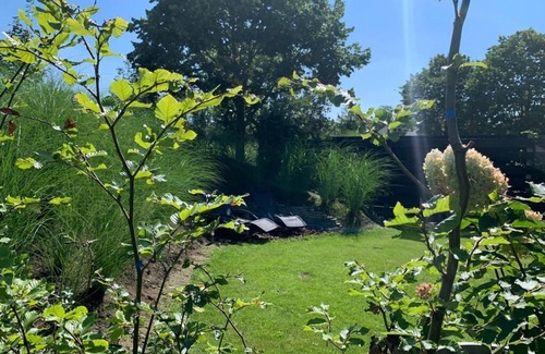 Wilbertoord Apartamento | Romantic luxury apartment great garden with fire table 5 minutes to the forest.