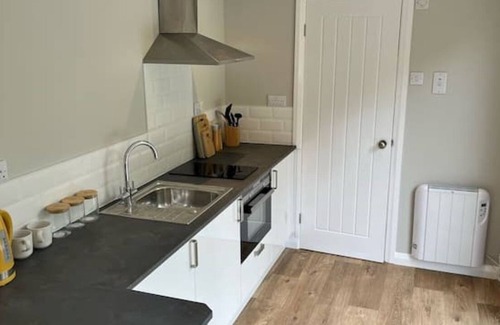 Legbourne Cabina | Romantic Riverside En-suite Cabin with Private Hot Tub
