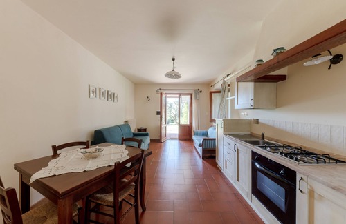 Castiglione del Lago Apartamento | Romantisch Appartement met Eigen Terras met Zicht op de Tuin met Zwembad!