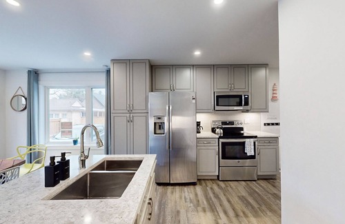 Grand Bend Cabaña | Rooftop patio Hot Tub/ 2 BBQ/ firepit/Full Games room/7 Beds/5 floors