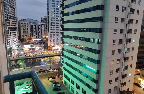 Al Majaz Casa | Room for Rent in a Family Apartment- Waterfront View