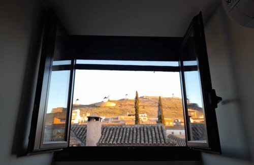 Consuegra Apartamento | Habitación 'La Centinela' con piscina compartida, Wi-Fi y aire acondicionado.