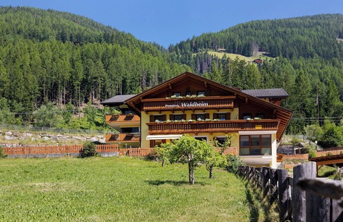 Valle Aurina Apartamento | Habitación 'Pension Waldheim 7' con vistas a la montaña, jardín compartido y Wi-Fi