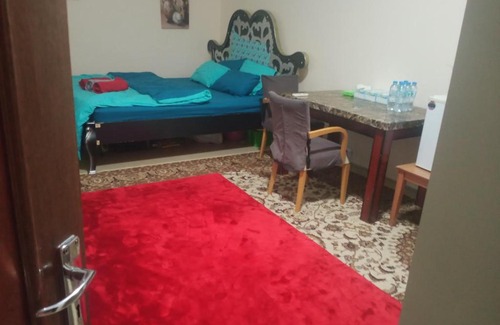 Al Ain Casa | Room with attached bathroom