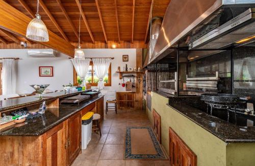 Carniel Casa | Rosa Casa Sereno 5 suítes