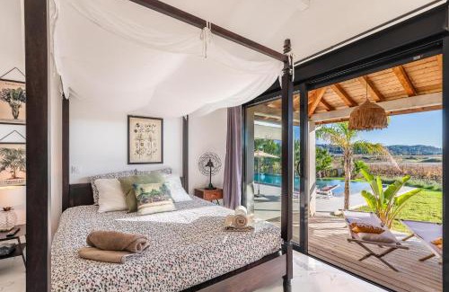 Plaissan Cama Y Desayuno | Royal Tiki Lodges - Maison d'hôtes avec Piscine chauffée Jacuzzi- Chambres ou Villa entière - Villa SCL