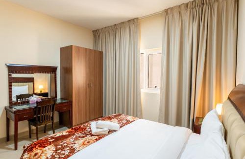 Al Majaz Apartamento | Royal Tulip - One Bedroom Apartment