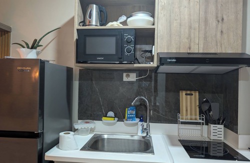 Basak Casa | RufiRemy Cozy Hideaway- Studio Condo with Balcony