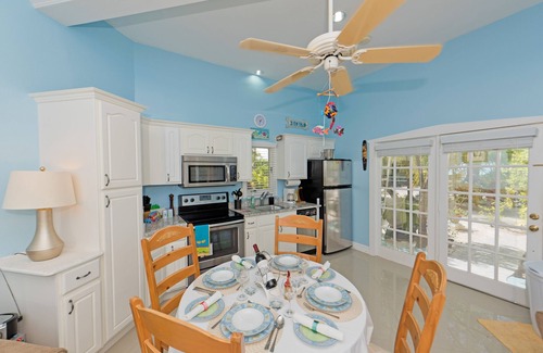 Rum Point Condominio | Rum Sands-A Cottage de lujo con encanto a pasos de Rum Point