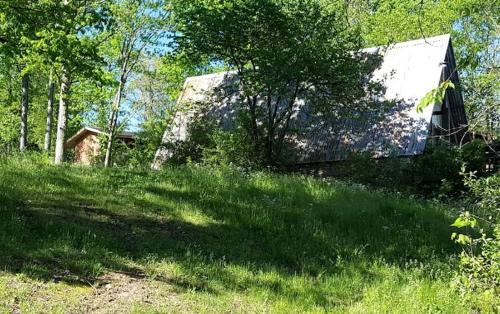 Grubville Casa | Rustic A-Frame Cabin in the Lush Woodlands of Grubville, Missouri