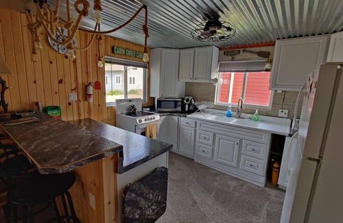 Ventura Casa | Rustic and charming two-bedroom home a block from the lake and park!