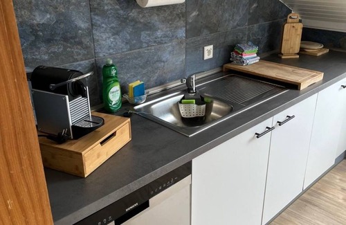 Allensbach Apartamento | Apartamento rústico con jardín.
