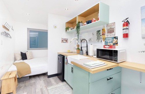 Coto Norte Cabina | Rustic cabin container with AC in charming Manatí for relaxing days