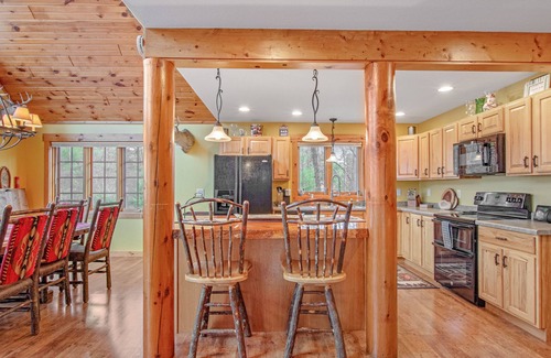Necedah Casa | Rustic lakefront home with shared dock & boat slip, game room & stunning gazeebo