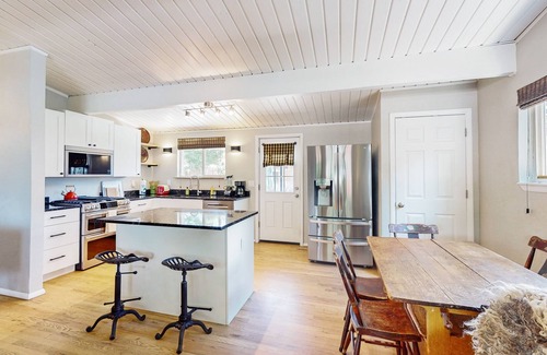 Central Colorado Springs Casa | Rustic mountain view home w/ large yard, pond, & updated kitchen - dog-friendly