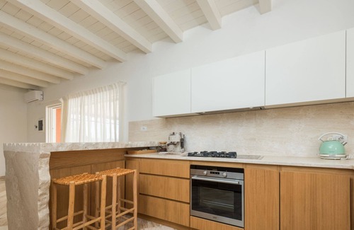 Baia Caddinas Apartamento | S'Abba e Sa Pedra - Apartamento de lujo junto a la piscina con vistas al mar