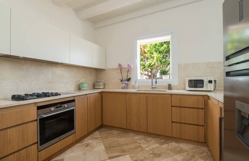 Baia Caddinas Apartamento | S'Abba e Sa Pedra - Apartamento de lujo junto a la piscina con vistas al mar