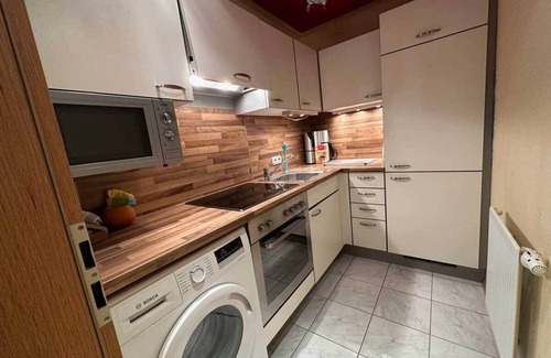 Maxlrain Apartamento | Sachrang: Ferien-wohnung am See mit Bergblick