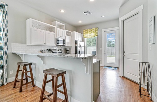Sailhouse Casa | Sailhouse home with private beach, fishing pier, covered decks, & shared pool