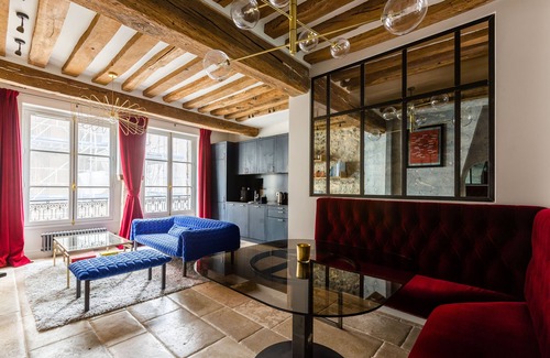 Les Iles Apartamento | Sobresaliente, artístico 1BR Home en el cuarto, a orillas del Sena, por Veeve