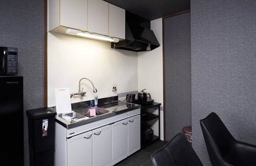 Shin-yashiki-cho Apartamento | SakuraPiso Twin Bedroom Non-Smoking Deluxe No.302 A stay-cation hotel in the center of Kagoshima City, ideal for business and sightseeing.