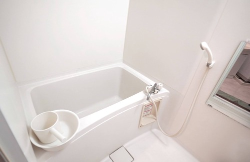 Shin-yashiki-cho Apartamento | SakuraPiso Twin Bedroom Non-Smoking Deluxe No.302 A stay-cation hotel in the center of Kagoshima City, ideal for business and sightseeing.