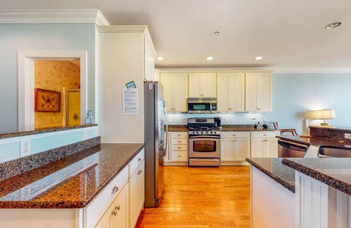 Fenwick Island Casa | Salt Meadows townhouse w/ elevator, gas fireplace & community pool and pier