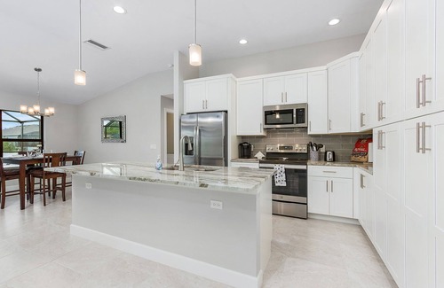 Burnt Store Casa | Salt water pool home with hot tub on fresh water canal and 40 foot pier 🌴