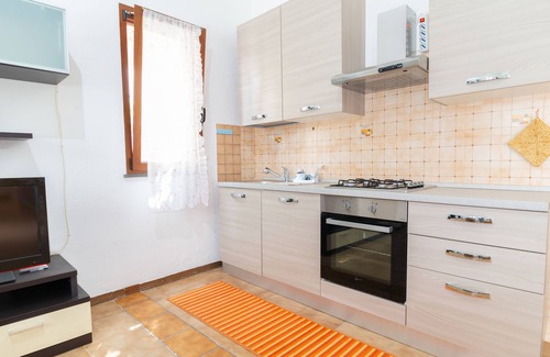 Capo Mannu Apartamento | Sandy House - Dos Habitaciones Piso, Capacidad 4