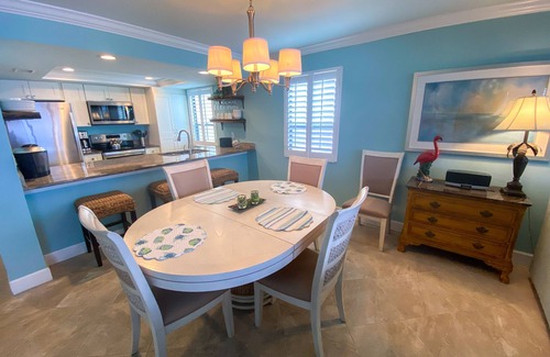 Punta Rassa Condominio | Vistas al agua, balcón privado alrededor del séptimo piso en Sanibel Harbour Resort