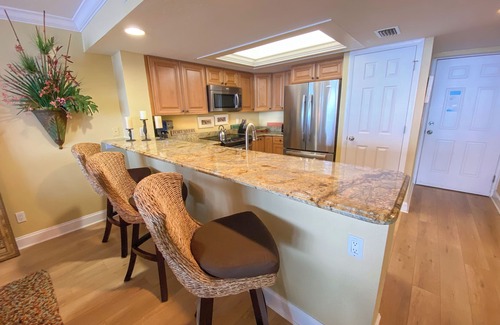 Punta Rassa Condominio | Condominio de 2 dormitorios frente al mar con increíbles puestas de sol en Sanibel Harbour Resort