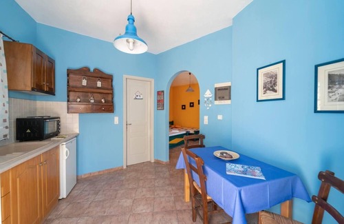 Megalochori Apartamento | Santorious Flower Covered Apartment