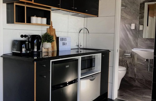 Penrose Apartamento | Santos Tiny House: Cozy Retreat under Auckland's Stars!