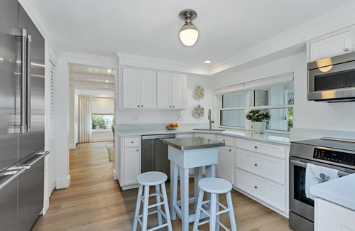 Cherokee Park Casa | Sarasota Renovated Waterfront Home with Dock Wide Open Bay Views Heated Pool