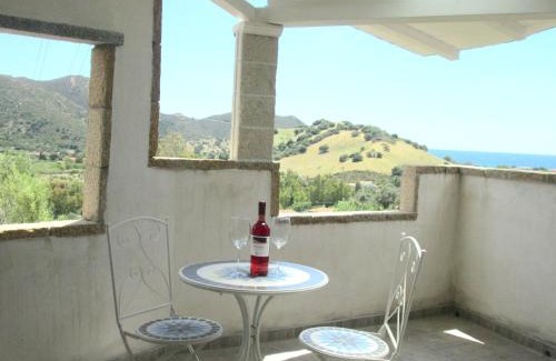 Solanas Casa | Sardinia Yellow House