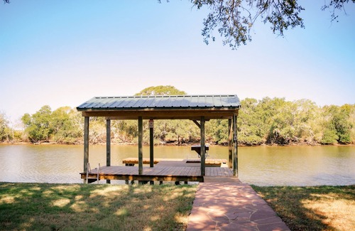 Cedar Lane Casa | SARGENT, TX Spacious, Creekfront Home, Amazing Outdoor Space & 2 Fishing Piers.