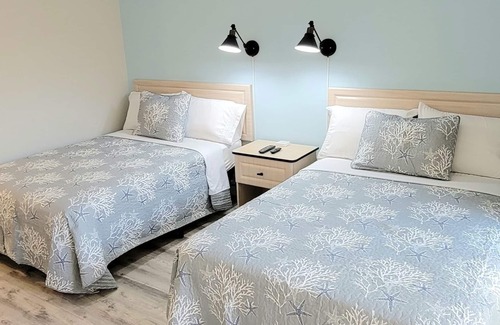 Treasure Island Hotel | Satellite Motel - Sun Kiss 114