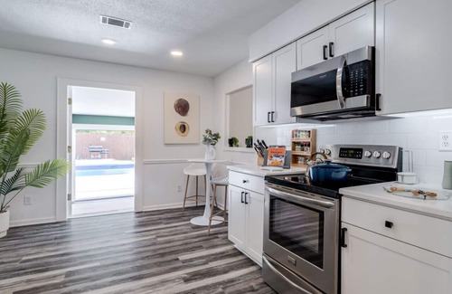 Savannah Casa | Savannah & Tybee Island Peach House! Pool + Hot Tub Game Room & Cabana