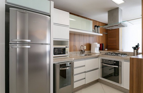 Cachoeira do Bom Jesus Apartamento | SEA FRONT | Balcony with Barbecue grill #CHA06