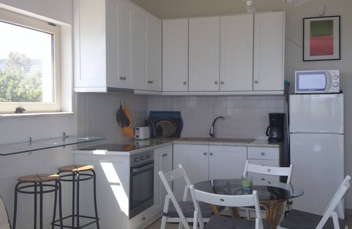 Petalidi Apartamento | Villa en el mar - Apartamento en planta superior. Relájese en la terraza, mire y escuche el mar.