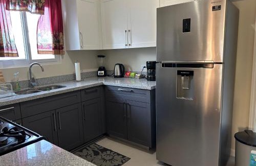 Lucea Casa | Seamist villa @Oceanpointe Lucea comfy 2BR w/pool gym & parking