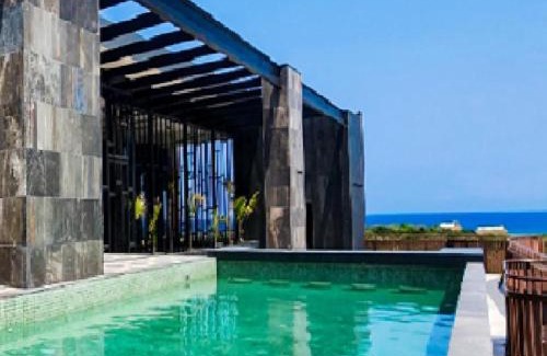 Zona Hotelera Apartamento | Seascape apartment near the beach with a sea-view rooftop and infinity pool