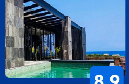 Zona Hotelera Apartamento | Seascape apartment near the beach with a sea-view rooftop and infinity pool