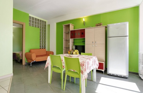 Reitani Apartamento | Apartamento junto al mar con barbacoa y jardín