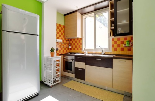 Reitani Apartamento | Apartamento junto al mar con barbacoa y jardín