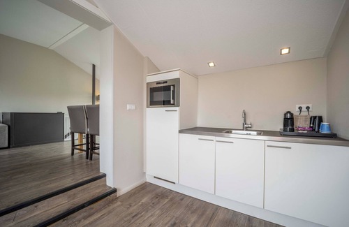 Westkapelle Hotel | Seaside Bliss with Outdoor Swimming Pool, Beach Loungers & Tennis Court Fun
